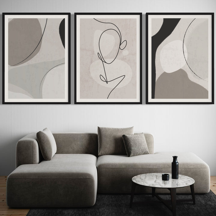 Modern Abstract Art Styled With A Low Grey Modular Sofa, Round Marble Coffee Table, And Minimal Black Accents. Perfect For A Minimalist Living Room.