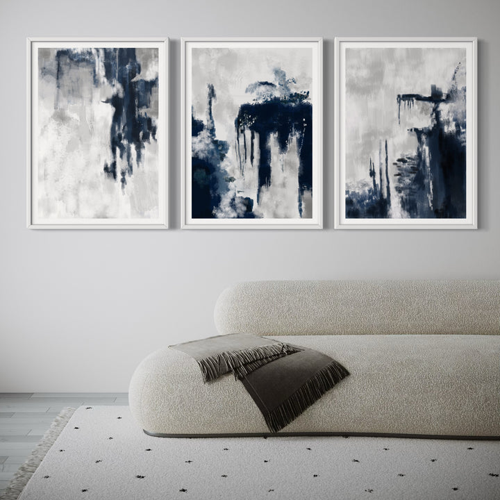 Modern Abstract Art Styled With A Curved Bouclé Chaise, White Frames, Soft Grey Wall, And A Minimal Speckled Rug. Perfect For A Minimalist Living Room.
