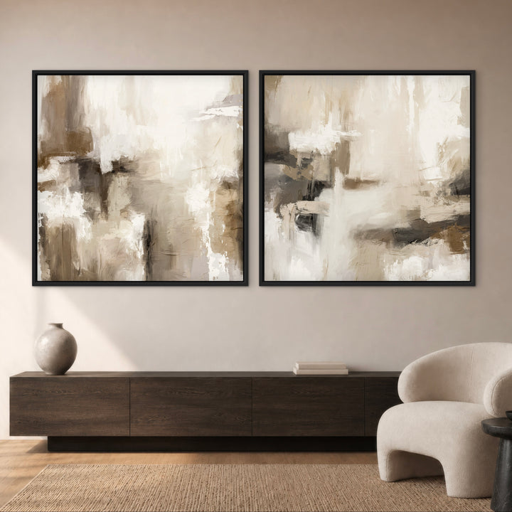 Santorini taupe abstract framed canvas pair above a dark wood sideboard