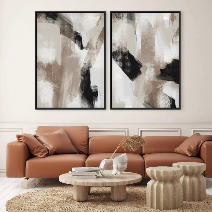 Soho set of two neutral abstract framed canvases above a tan leather sofa