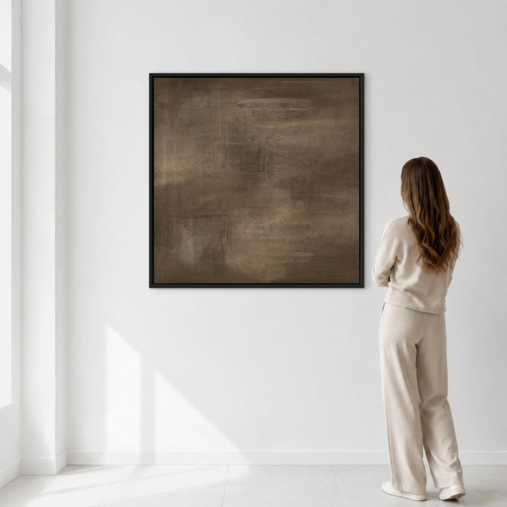 Fading Ember brown abstract framed canvas shown with a person for scale