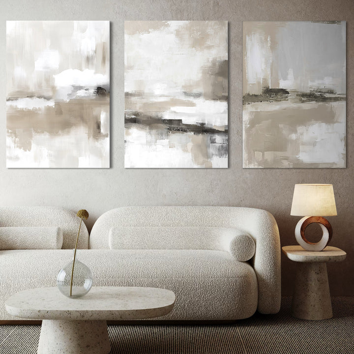 Elegant Minimalist Wall Art Decor Styled With A Curved Bouclé Sofa, A Textured Stone Coffee Table, And A Modern Ring-Base Table Lamp. Perfect For A Sophisticated Neutral Living Room.