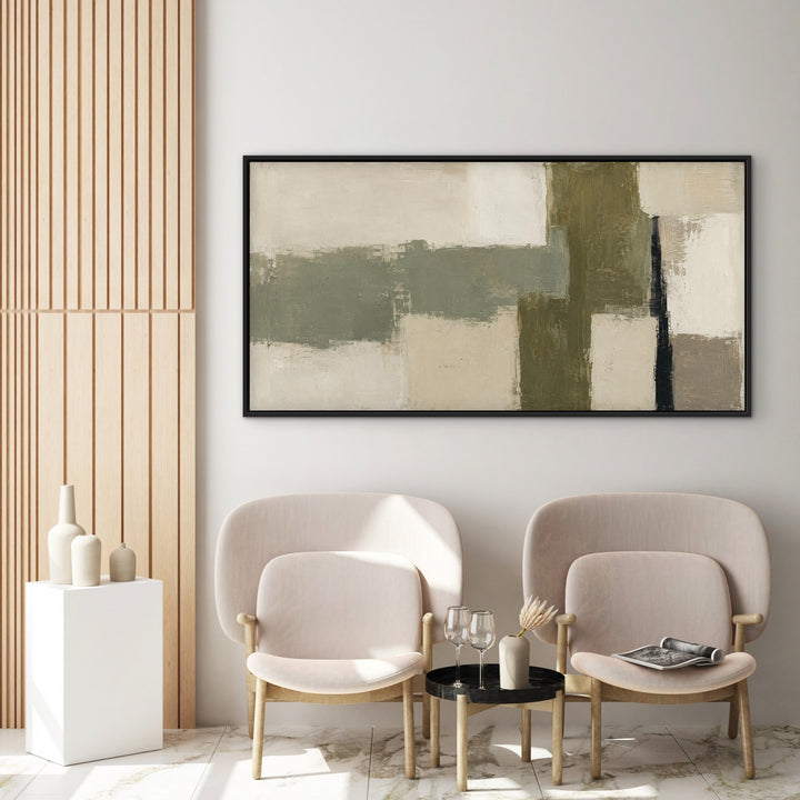 Olive Structure geometric panoramic framed art above two sculptural cream chairs