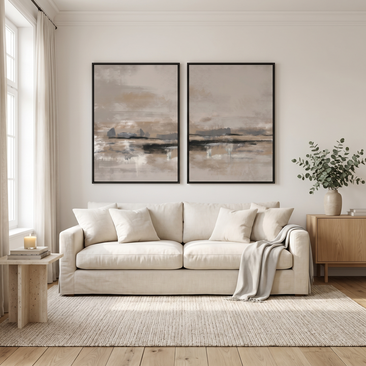 Rome set of 2 framed canvas in black frames above a cream linen sofa in a bright living room - neutral abstract wall art pair