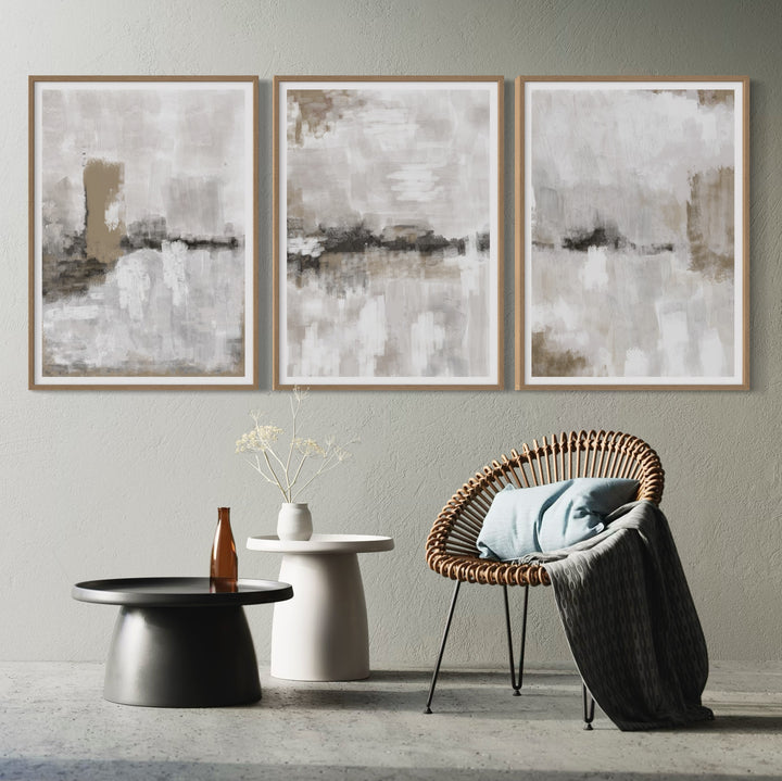Modern Abstract Art Styled With A Rattan Accent Chair, Black And White Pedestal Tables, Dried Stems, And A Soft Grey Wall. Perfect For A Minimalist Living Room Or Reading Nook.