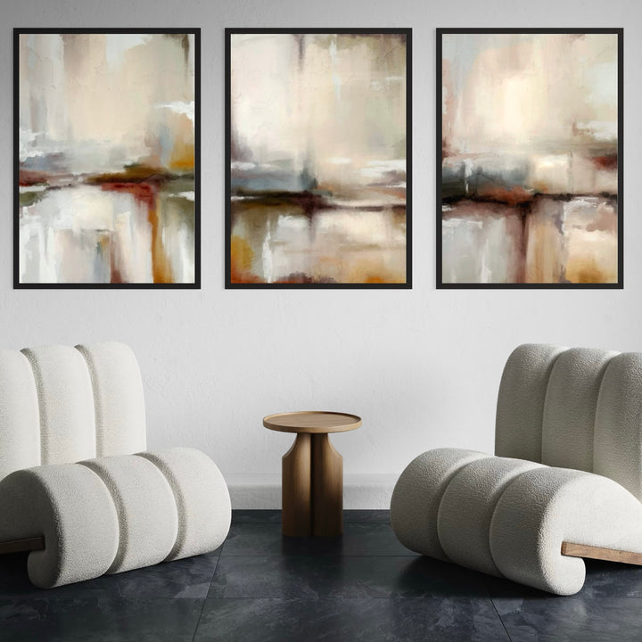 Modern Abstract Wall Art Styled With Two Curved Bouclé Lounge Chairs, A Sculpted Wood Pedestal Side Table, Black Stone Tile Flooring, And A Clean White Wall. Perfect For A Minimalist Living Room Or Lounge.