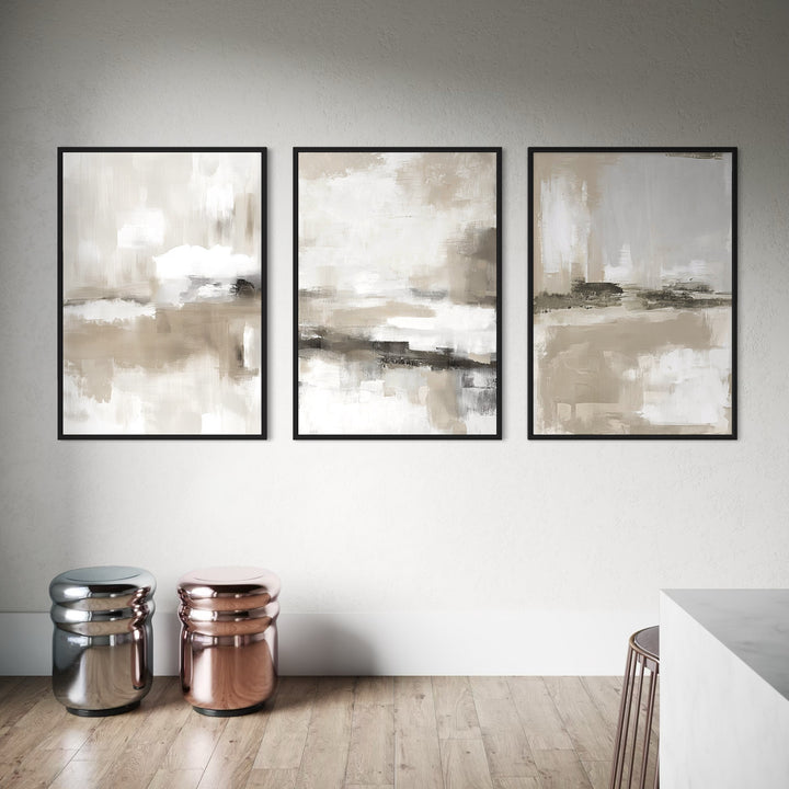 Framed Canvas Neutral Abstract Triptych Wall Art with Metallic Accent Stools and Light Wood Flooring in Modern Minimalist Interior