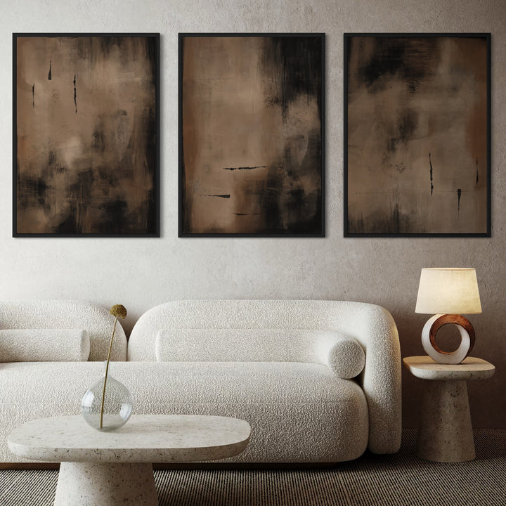 Modern Abstract Framed Canvas Wall Art Above a Boucle Sofa With a Stone Table and Ring Lamp, Moody Modern Wall Art to Warm Up a Minimalist Living Room.