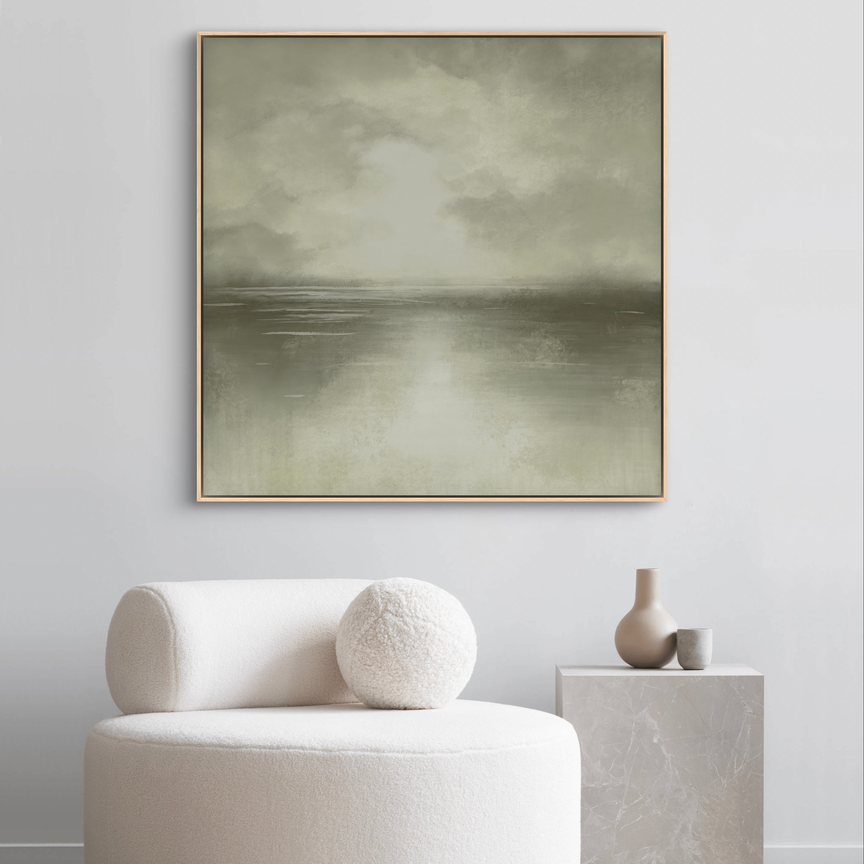 Minimalist Abstract Art Wall Styled with Cream Bouclé Lounge Chair with Round Pillow, Gray Marble Cube Side Table, and Taupe & Gray Ceramic Vases. Perfect for Contemporary Reading Nook.
