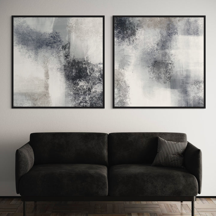 Modern Abstract Canvas Paintings Styled With a Black Velvet Sofa With a Houndstooth Cushion in a Minimalist Modern Living Room.
