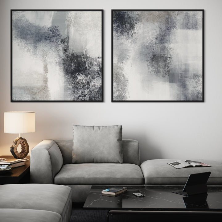 Abstract Canvas Paintings Styled With a Light Grey Sectional Sofa With a Black Marble Coffee Table and Decorative Lamp in a Cozy Living Room