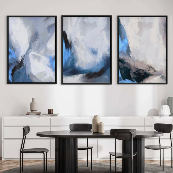 Modern Abstract Wall Art Styled With A Black Round Pedestal Dining Table, Four Black Metal Dining Chairs, A Clean White Sideboard, and Decorative Accent. Perfect For A Minimalist Dining Room Or Contemporary Kitchen Nook.