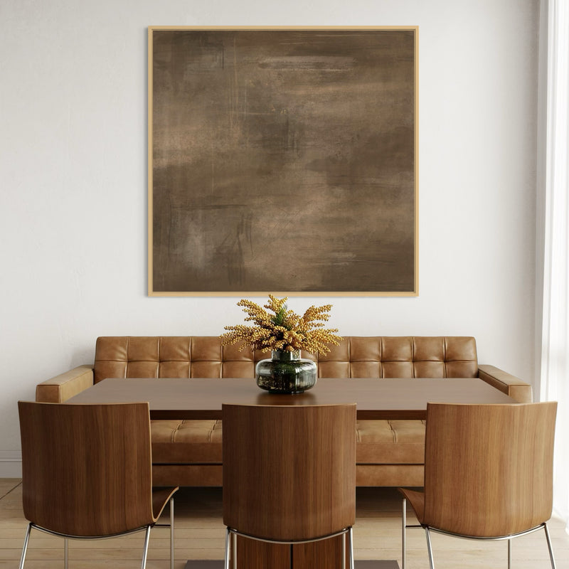 Modern Abstract Wall Art Styled With a Tufted Camel Leather Dining Banquette, Walnut Dining Chairs, a Smooth Wood Table, a Clear Glass Vase With Golden Botanicals. Perfect For a Minimalist Cozy Dining Room.