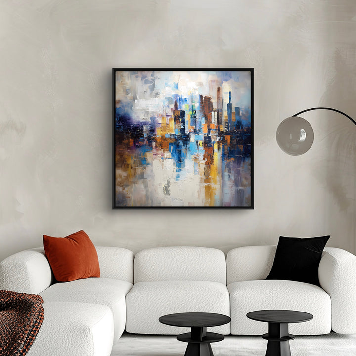 Framed Abstract Canvas Wall Art in a Cozy Modern Living Room with Curved White Boucle Sofa, Neutral Wall, and Black Accent Tables