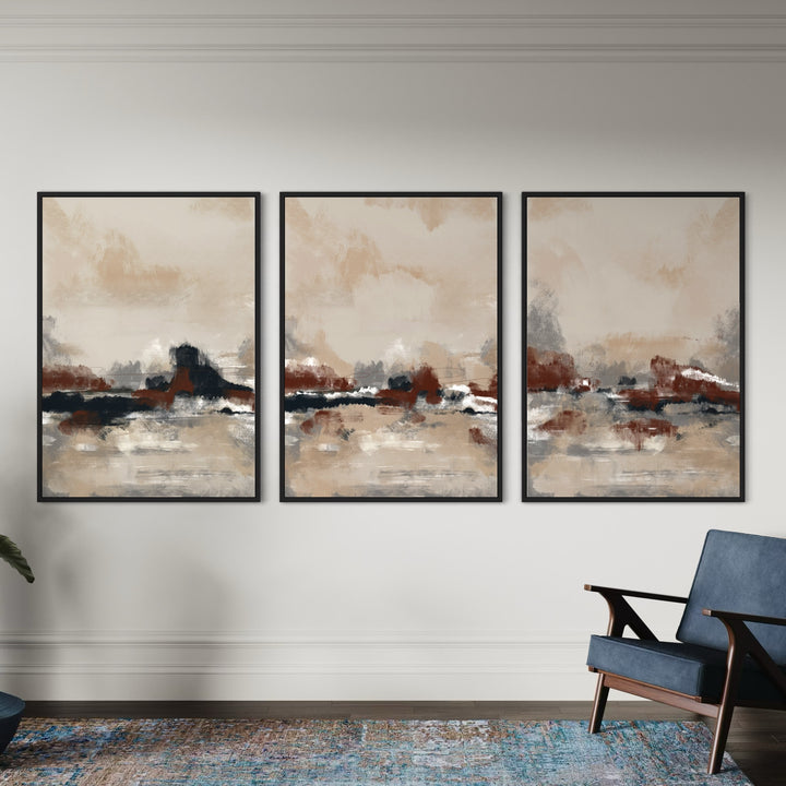 Abstract Canvas Wall Art In Sleek Black Frames Grounds A Classic White Wall- Blue Mid-Century Lounge Chair And A Weathered Multi-Tone Rug For A Warm, Modern Living Room.