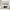 Stylish Abstract Framed Canvas Art in Neutral Living Room with Sculptural Armchairs, Black Console Table, and Textured Decor Accents