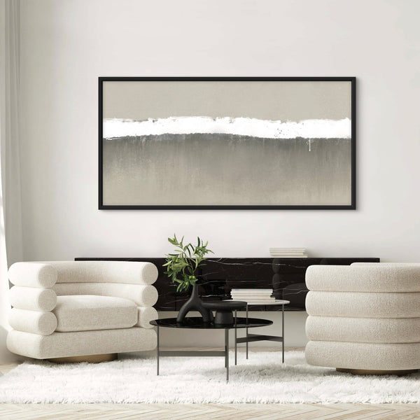 Stylish Abstract Framed Canvas Art in Neutral Living Room with Sculptural Armchairs, Black Console Table, and Textured Decor Accents