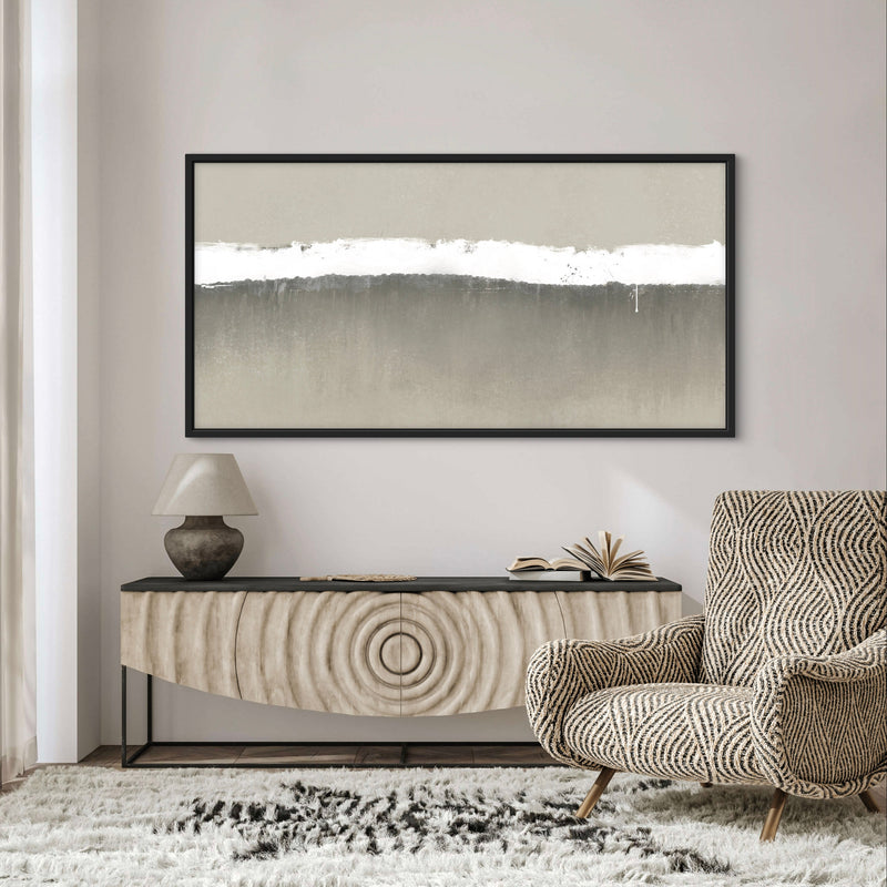 Neutral Abstract Framed Canvas Wall Art Above Textured Console Table and Patterned Accent Chair in Cozy Modern Living Room