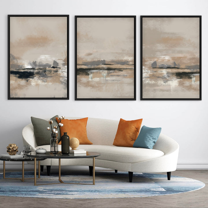 Rome set of three neutral framed canvases above a curved cream sofa