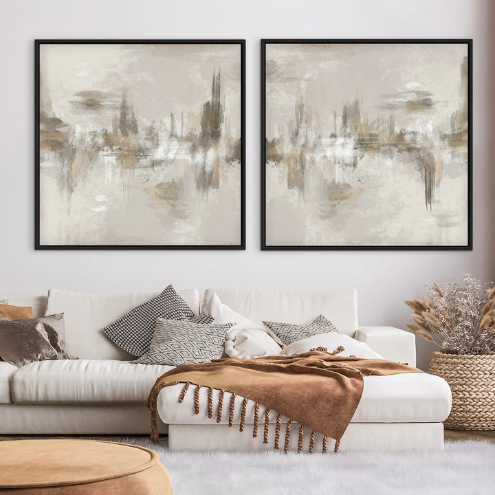 Neutral Depths neutral framed canvas pair above a white sofa with a brown throw
