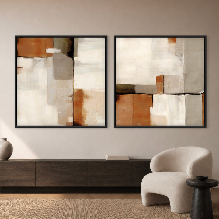 Sahara set of two warm neutral framed canvases above a dark wood sideboard