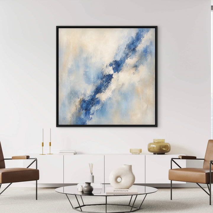 Lazuli blue and ivory framed canvas above a white sideboard