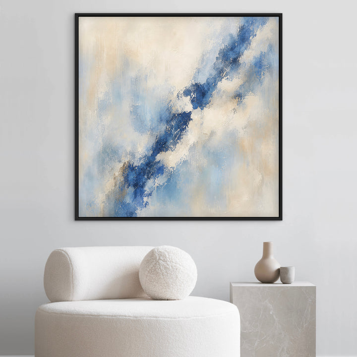 Lazuli lapis blue abstract framed canvas above a sculptural cream chair