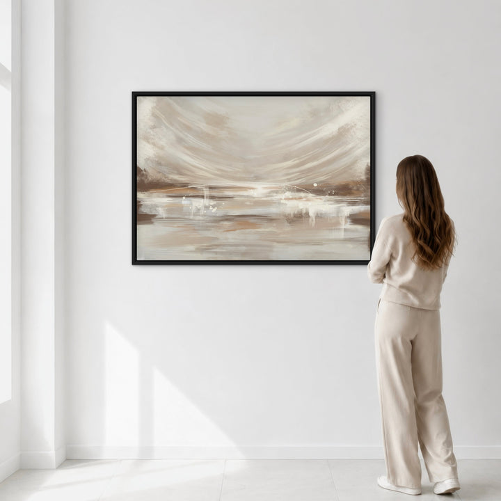 Vienna framed canvas in a black frame on a white wall, shown with a person alongside for scale