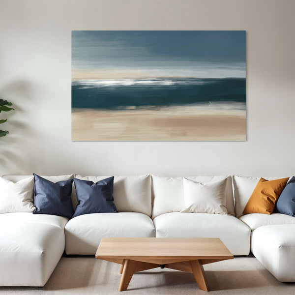 Living room with a white sofa, wooden coffee table, and abstract beach painting on the wall.