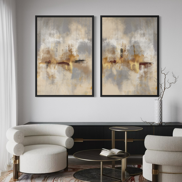 Gold Serenity set of two gold and grey abstract framed canvases above sculptural cream chairs