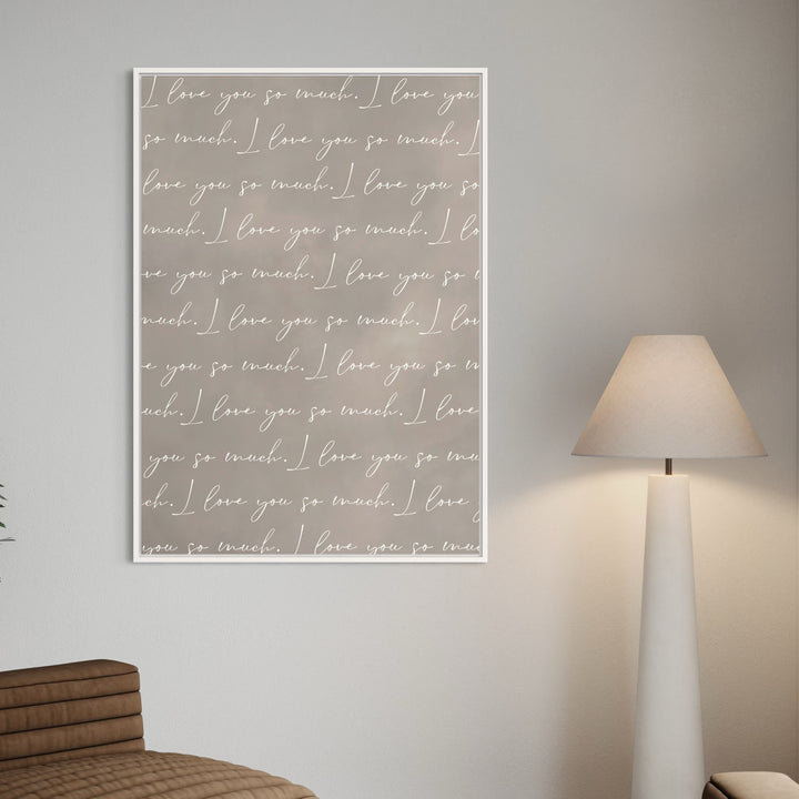 Love-Quote Canvas “I love you so much” Styled With Brown Lounge Chairs, a White Floor Lamp, and Greenery For a Cozy Modern Living Room.