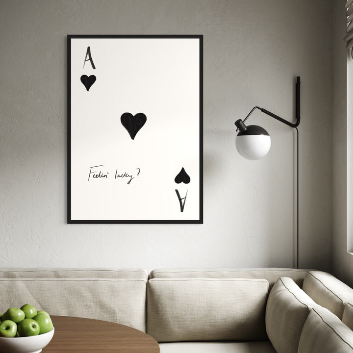 Ace Playing-Card Framed Canvas Print Wall Art with  Cream Banquette and Wood Table, Paired with a Black Globe Sconce—Perfect For Minimalist Living Room