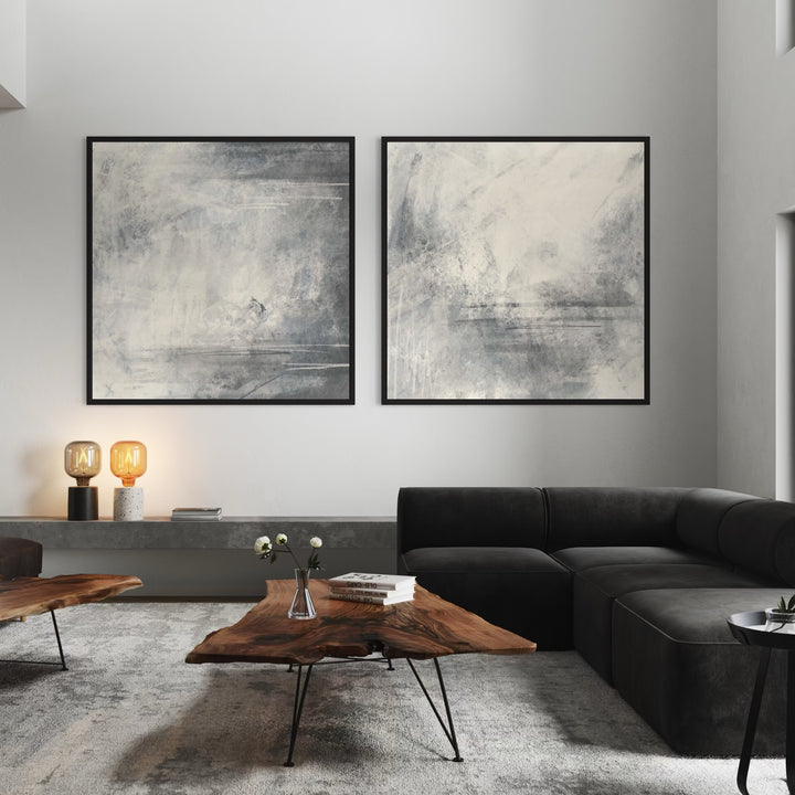 Blue-Grey Abstract Diptych Above a Black Sectional with Live-Edge Tables and Amber Lamps—Serene Modern Wall Art to Elevate a Minimalist Living room.