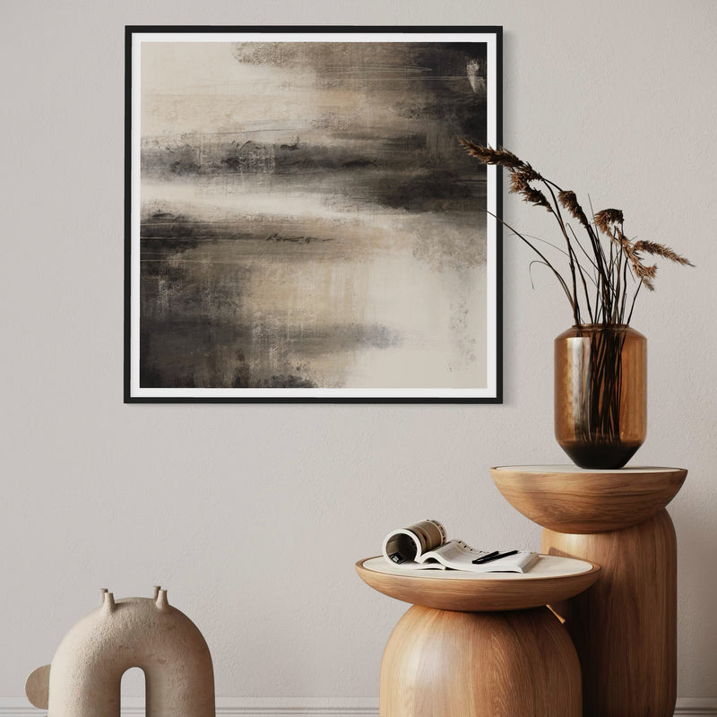 Modern Abstract Framed Art paired with Sculptural Wood Pedestals, Ceramic Decor, and Dried Botanical Arrangement in a Warm Minimalist Interior.