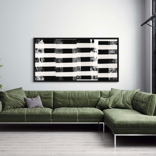 Contemporary Abstract Framed Canvas Wall Art - Styled Above a Modern Green Sectional Sofa with a Patterned Pillow, Perfect for a Chic Living Space.