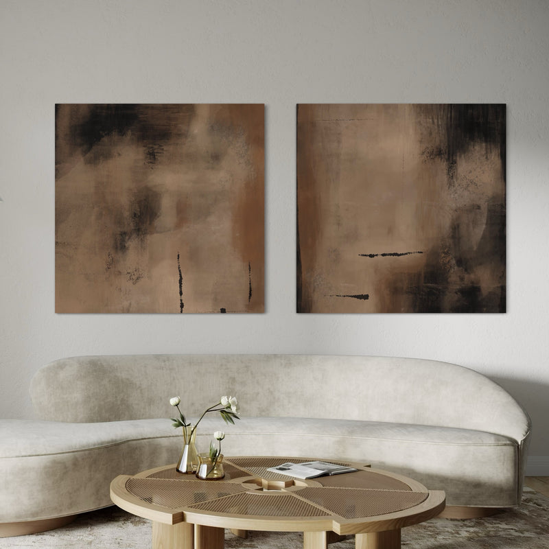 Set of Two Abstract Modern Wall Art Prints With Cream Curved Sofa in Contemporary Living Room with Minimalist Round Wood Coffee Table and Gold Vase Decor.