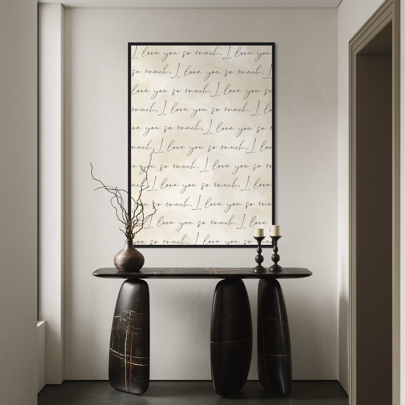 Cream Love-Quote Canvas Above a Sculptural Black Marble Console With Branches and Candlesticks, Elevate Your Entryway with Minimalist, Modern Wall Art.