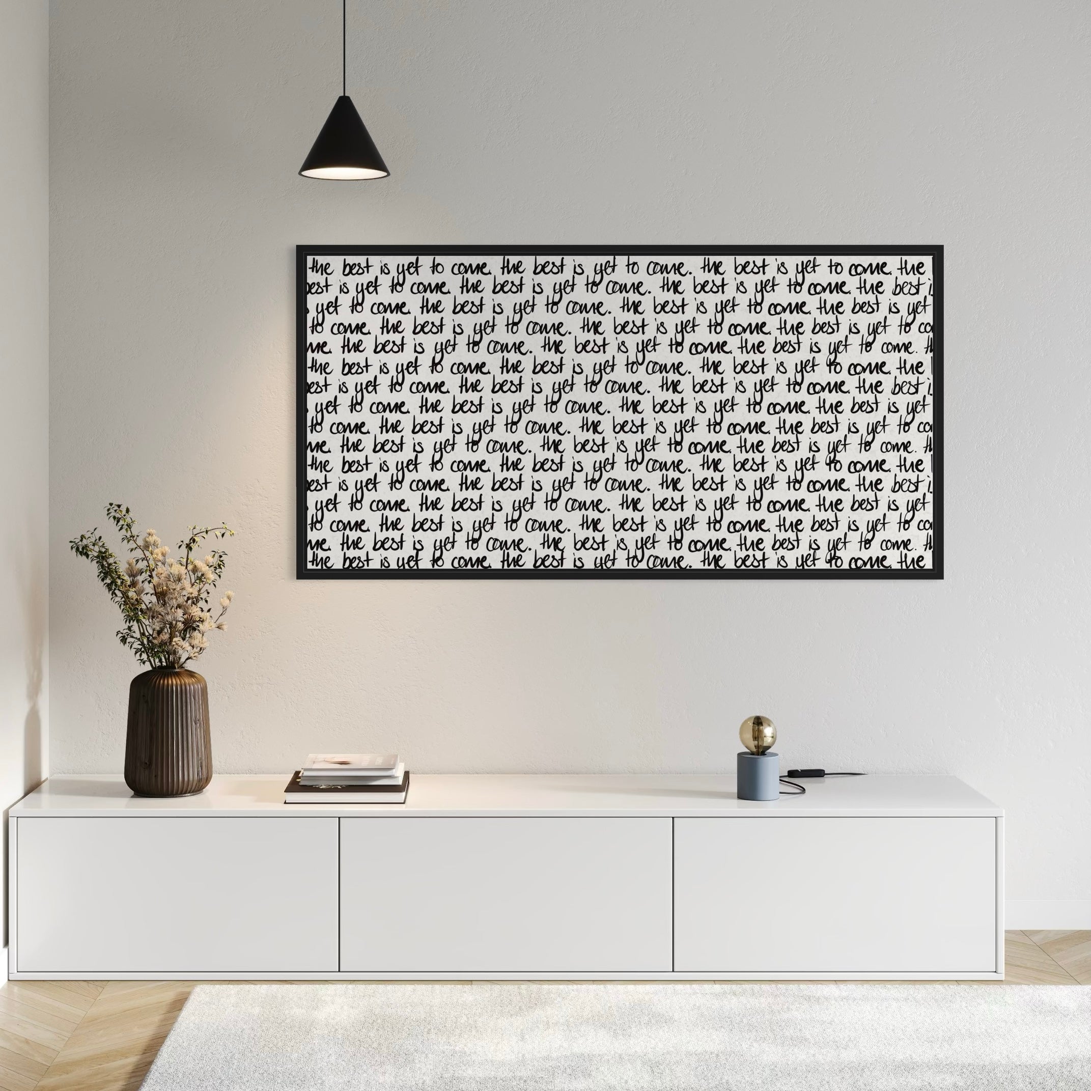 Elegant Wall Art in Living Room –  Paired with a minimalist white wall,  Styled with a sleek low-profile white console, matte black pendant light, and a tall ribbed ceramic vase with soft florals