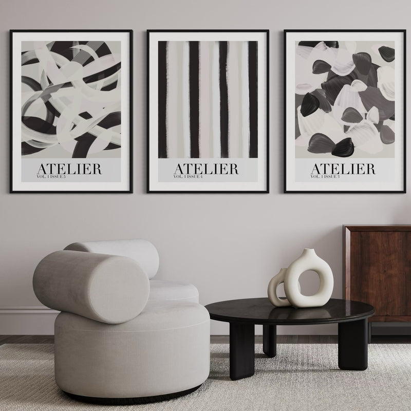 Elegant Abstract Framed Wall Art – Contemporary Living Space with Sculptural Round Lounge Chair, Minimalist Black Coffee Table, and Organic Ceramic Decor – A Perfect Blend of Modern Art and Interior Sophistication