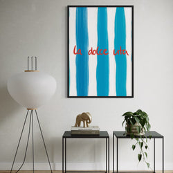 Unique Hallway Abstract Framed Wall Art Decor with Minimalist Black Side Tables, Sculptural Decor, and Indoor Plant Accents