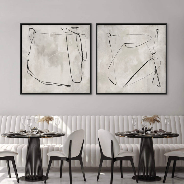 Abstract Art Framed Canvas in Styled with a White Fluted Banquette, Black Round Pedestal Dining Tables, and White Dining Chairs. Perfect for a Minimalist Dining Room.