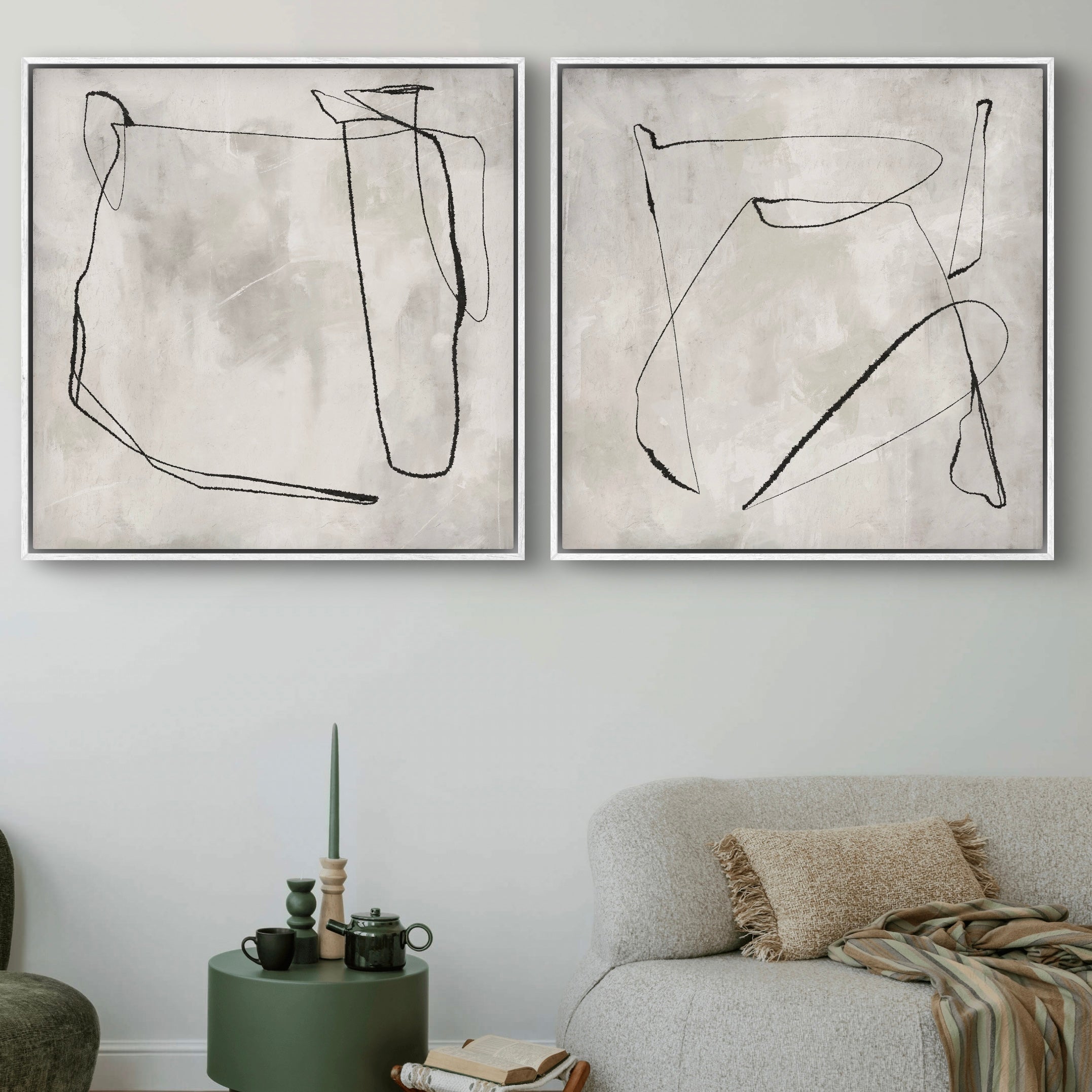 Modern Abstract Line Art Framed Duo Over a Boucle Sofa With a Sage Side Table—Perfect Minimalist Decor.