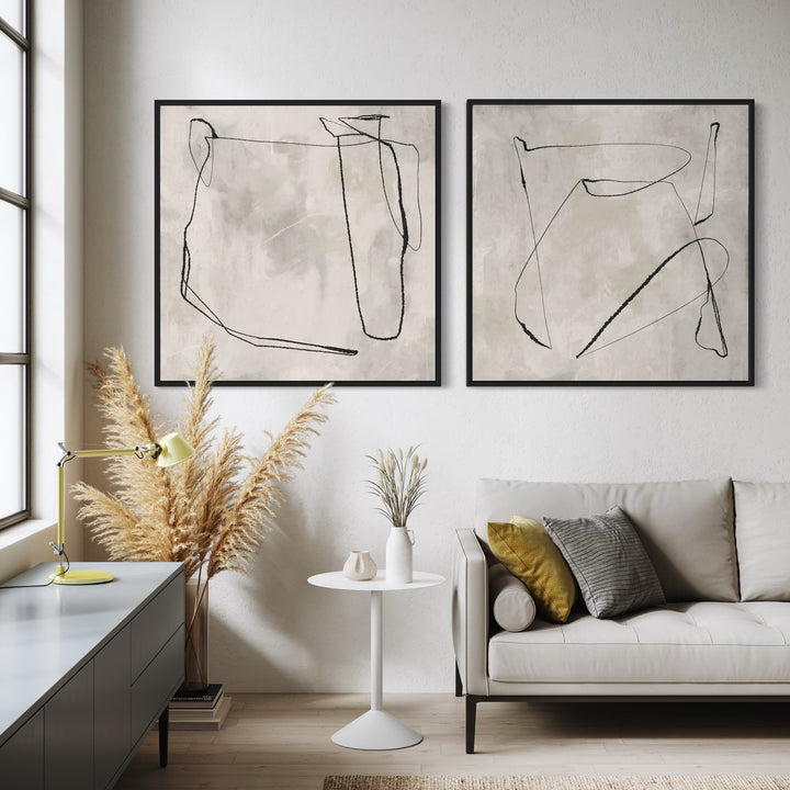 Modern Abstract Line Art Framed Canvas set styled with a taupe sofa, mustard-gray pillows, pampas grass, and a white tulip table—perfect for a minimalist living room.