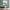Modern Abstract Art Framed Canvas Styled with a Mint Green Writing Desk, Cream Upholstered Chair, and Dried Grass in a Glass Vase. Perfect for a Minimalist Home Office.