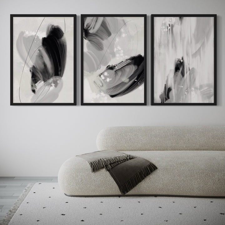 Modern Abstract Art Styled With A Curved Bouclé Chaise, White Frames, Soft Grey Wall, And A Minimal Speckled Rug. Perfect For A Minimalist Living Room.