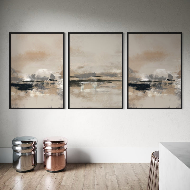 Modern Abstract Art Triptych Styled with Metallic Chrome and Rose Gold Stools, Warm Wood Plank Flooring, and a White Waterfall Counter. Perfect for a Minimalist Living Room.