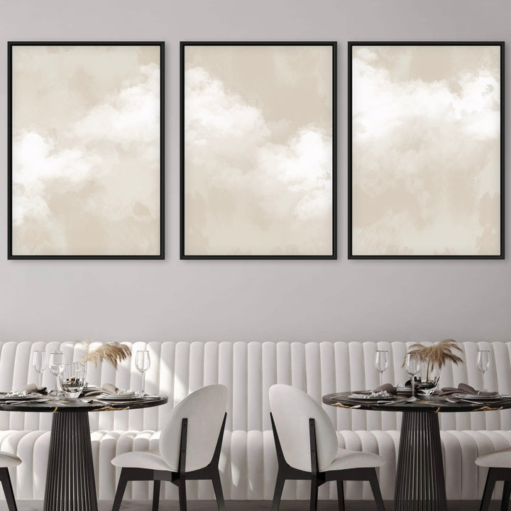 Modern Abstract Art Framed Canvas Styled with a White Fluted Banquette, Black Round Pedestal Dining Tables, and White Dining Chairs. Perfect for a Minimalist Dining Room.
