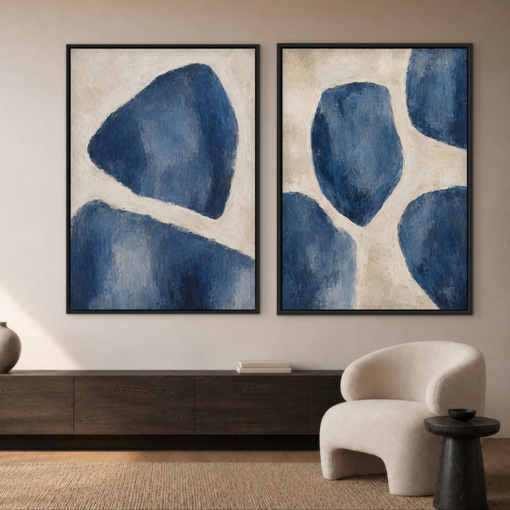 Bleu Forms set of two organic blue abstract framed canvases in a warm luxury interior
