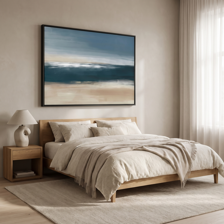 Coastal Whisper framed canvas in black frame above an oak bed with linen bedding - teal, blue and beige abstract wall art