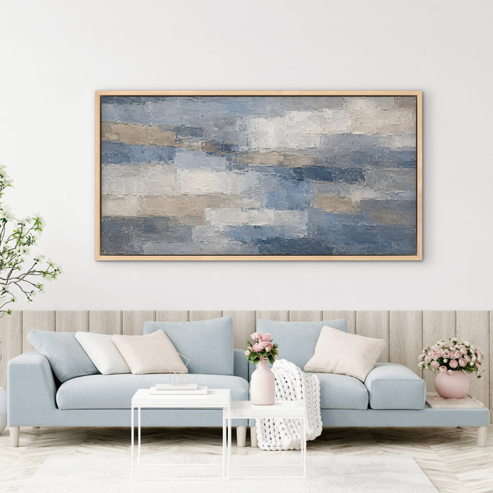 Denim Quarry blue grey panoramic abstract framed canvas in a pale blue living room